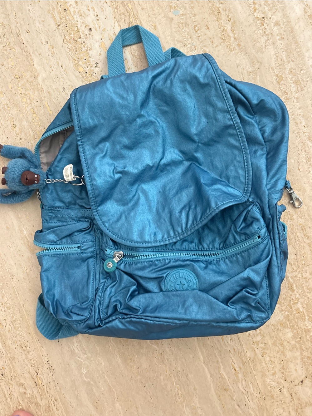 Kipling metallic blue Women's Backpack with Plush Keychain